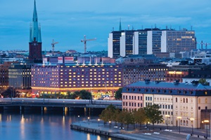 Aerial of buildings and Riddarfjärden bay, Lake Mälaren at night